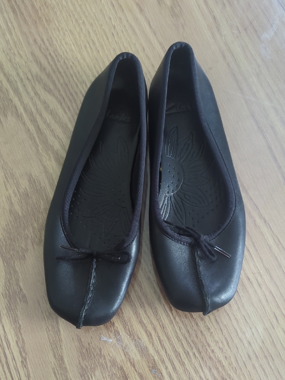 Clarks Black Leather Square-Toe Ballet Flats with Bow Accent
